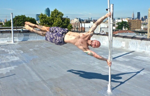 Human Flag posture calisthenics, bodyweight training, strength training.